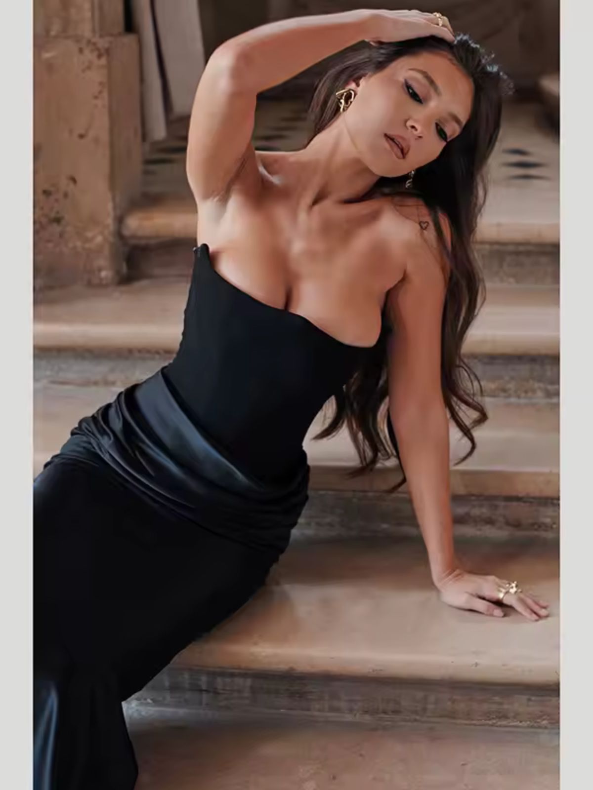 Celestine Corset Maxi Dress - Black, elegant lifestyle shot capturing the timeless allure of this black maxi dress.