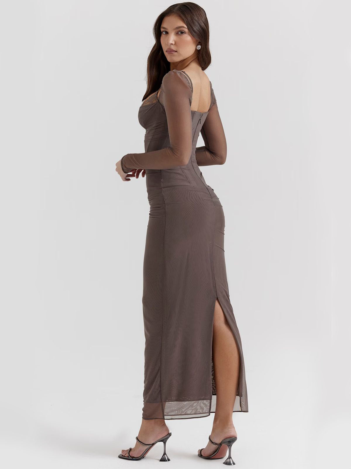 Gray lace maxi dress featuring a stylish back slit and sheer sleeves, a timeless choice for evening events.