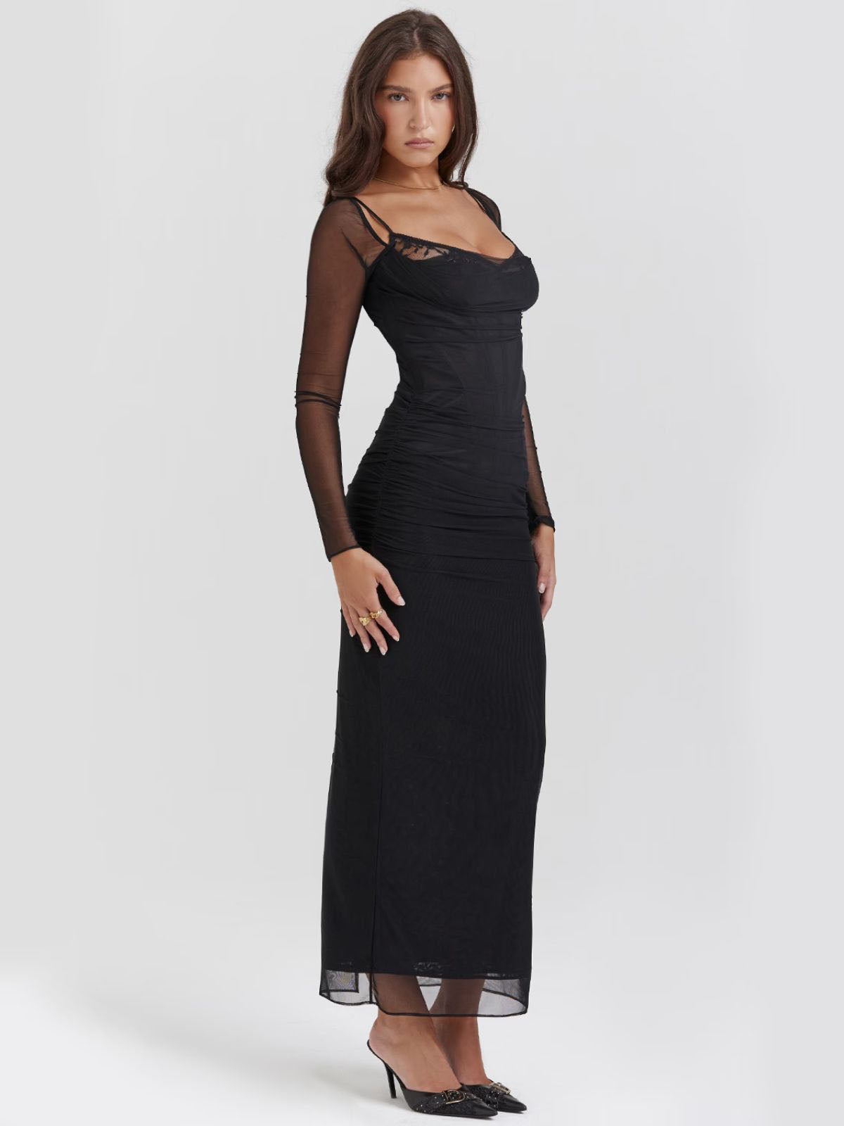 Sable black lace maxi dress side view with sheer sleeves and elegant fitted design, perfect for evening wear.