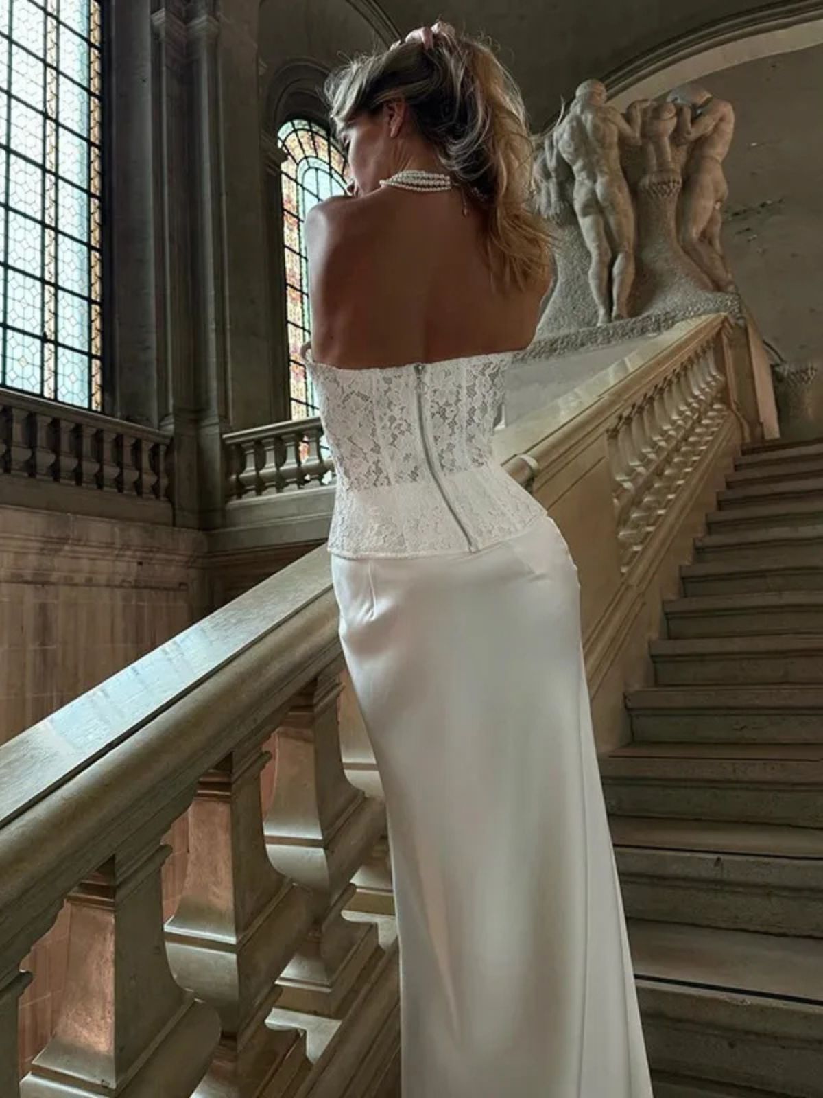Bandeau Corset Dress back view with a lace-up corset and elegant satin finish.