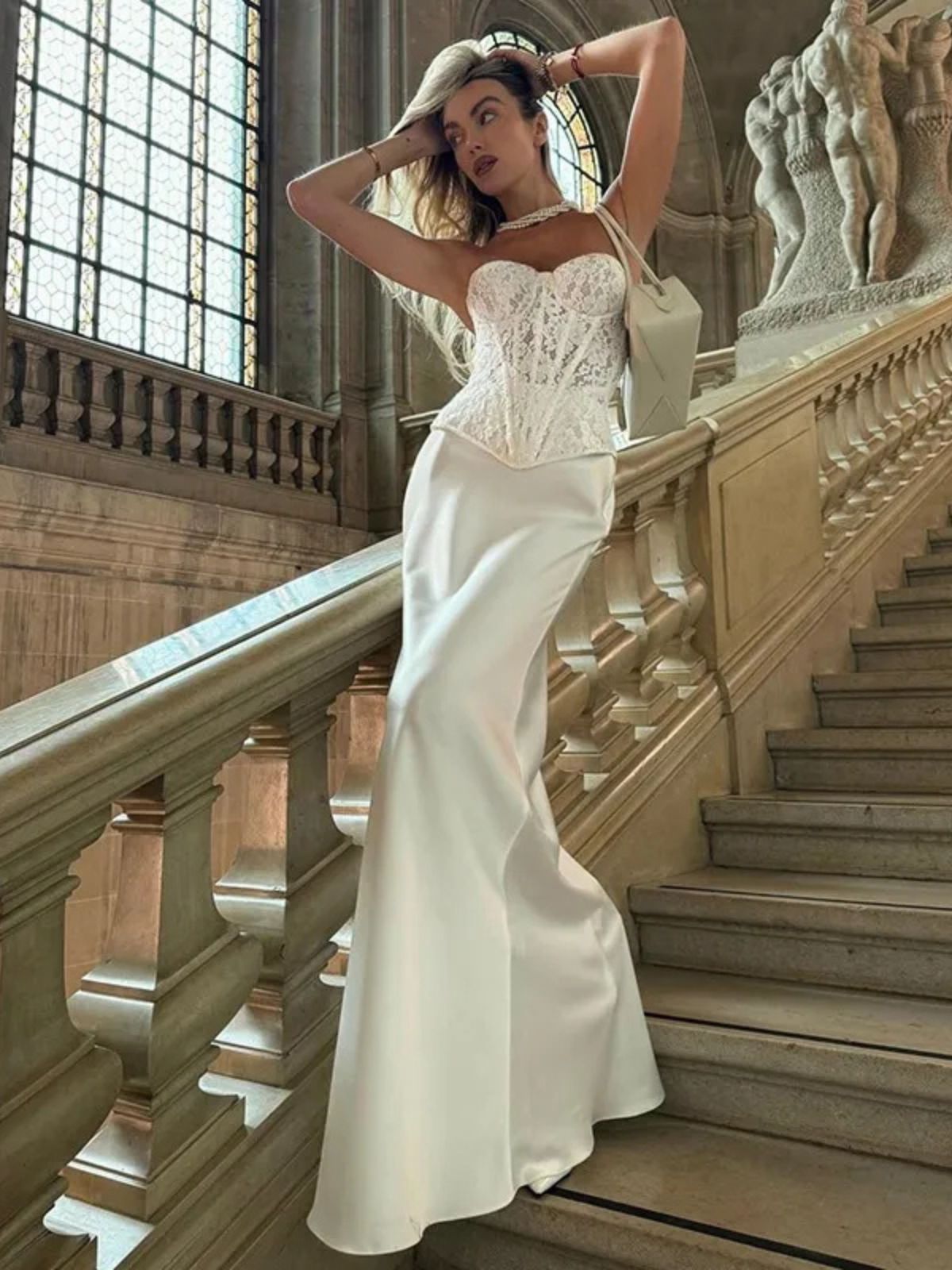 Bandeau Corset Dress with an elegant fit, combining a lace top with a smooth satin skirt.