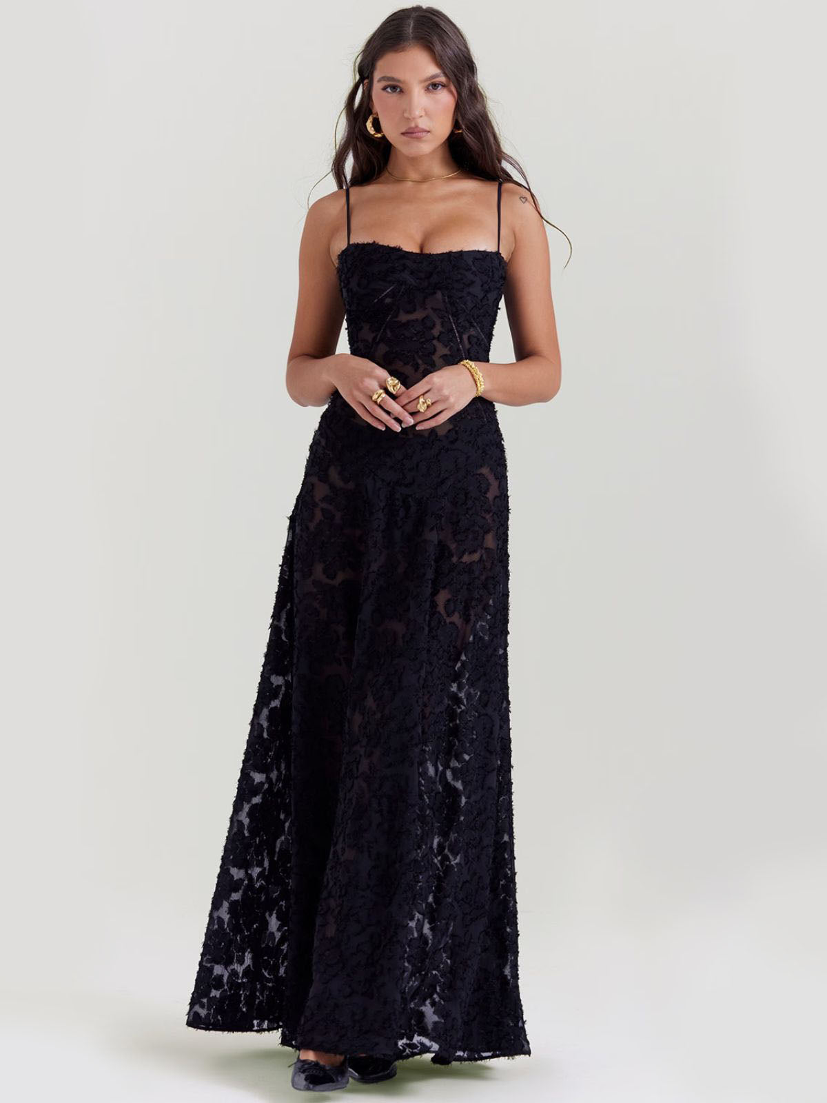 Black floral maxi dress with a lace-up corset back, adjustable fit, and flowy silhouette—ideal for an elegant statement look.