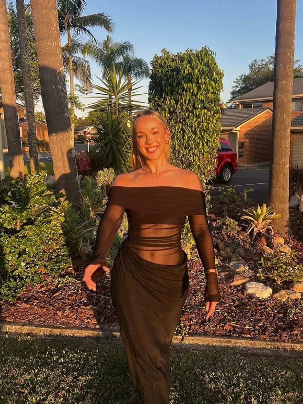 Black Orchid Off-Shoulder Dress, socialite-style long dress, featuring raglan sleeves and sexy transparent accents.