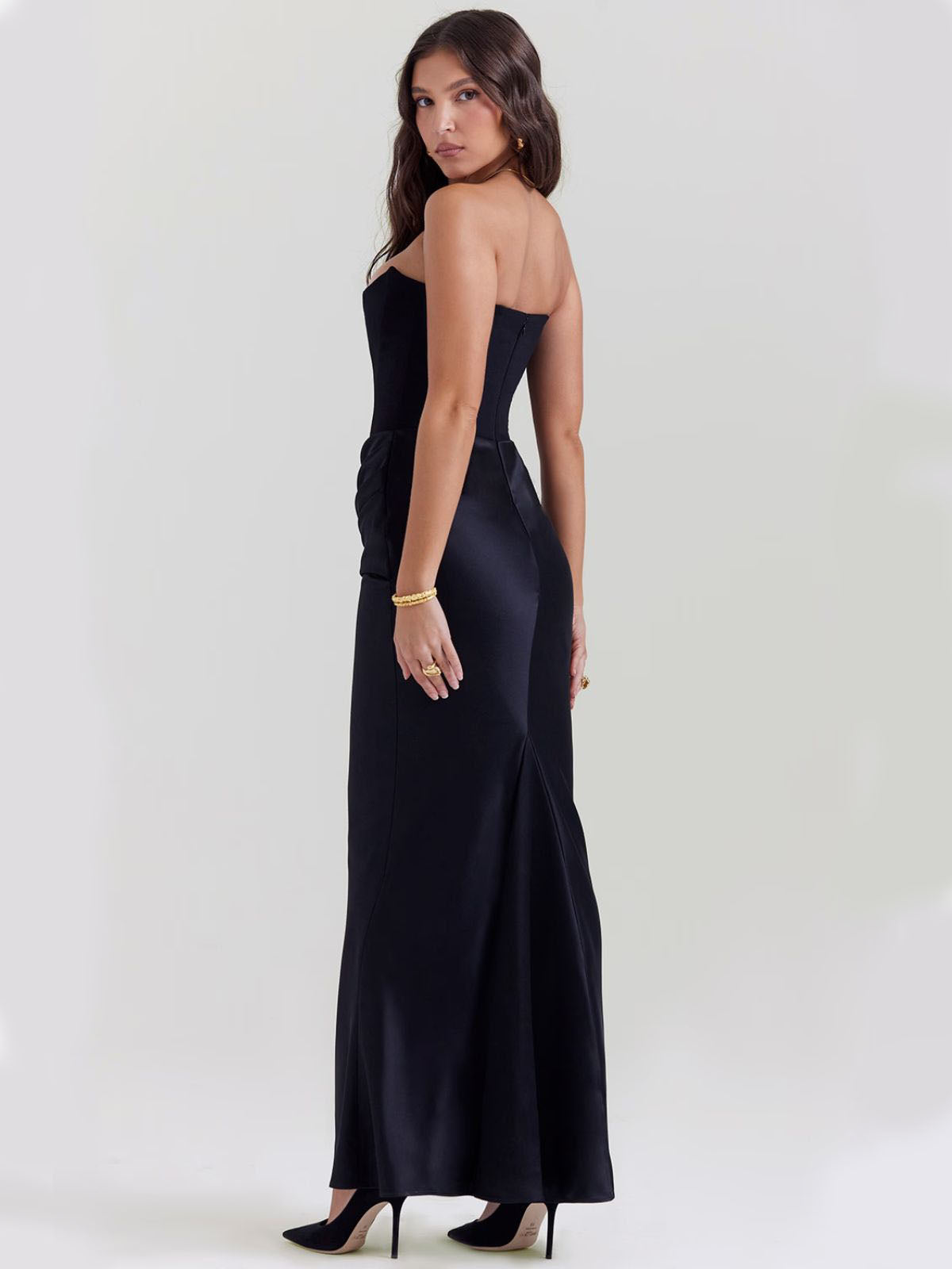 Celestine Corset Maxi Dress - Black, side view showcasing the sleek corset bodice and elegant satin maxi silhouette.