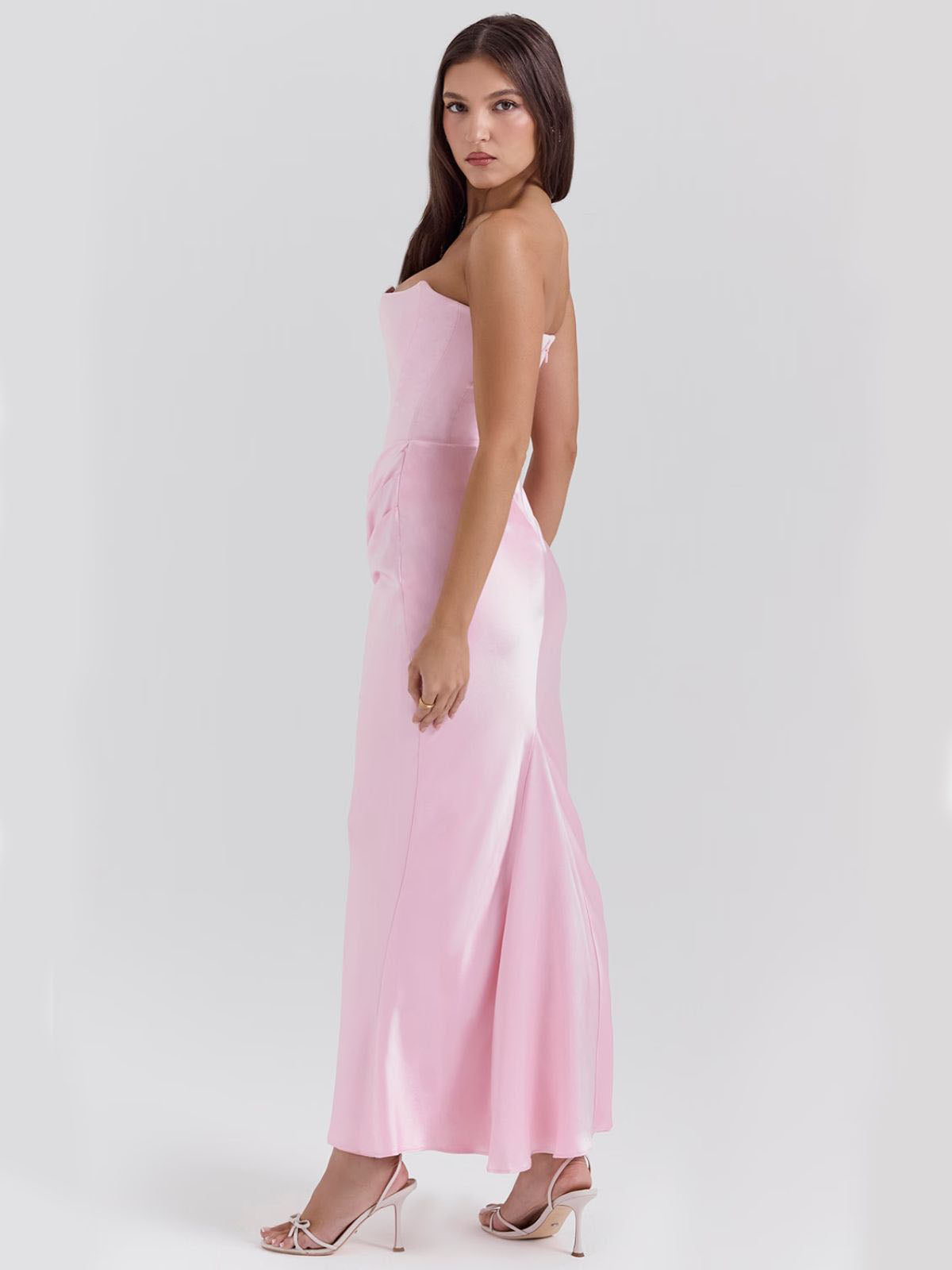Celestine Corset Maxi Dress - Pink, side view showcasing the sleek satin fabric and structured corset bodice.