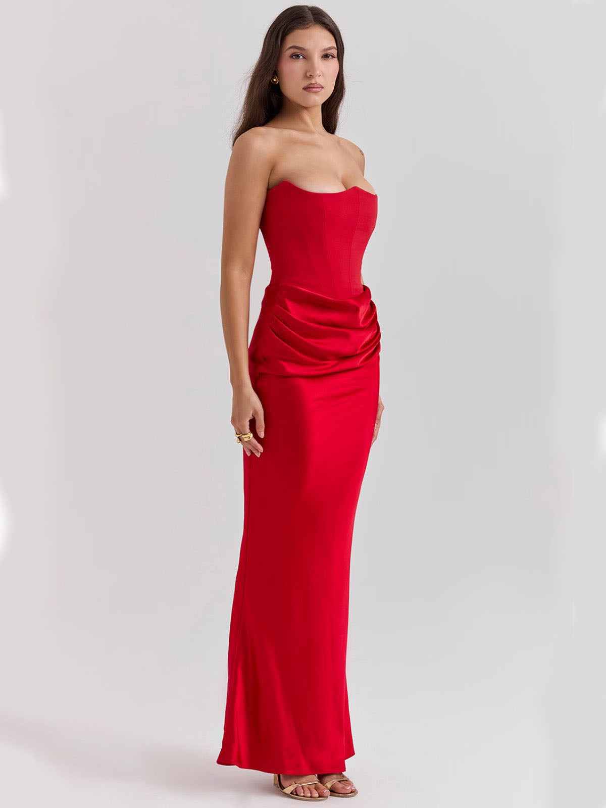 Celestine Corset Maxi Dress - Red, side view showcasing the fitted corset bodice and sleek satin maxi silhouette.