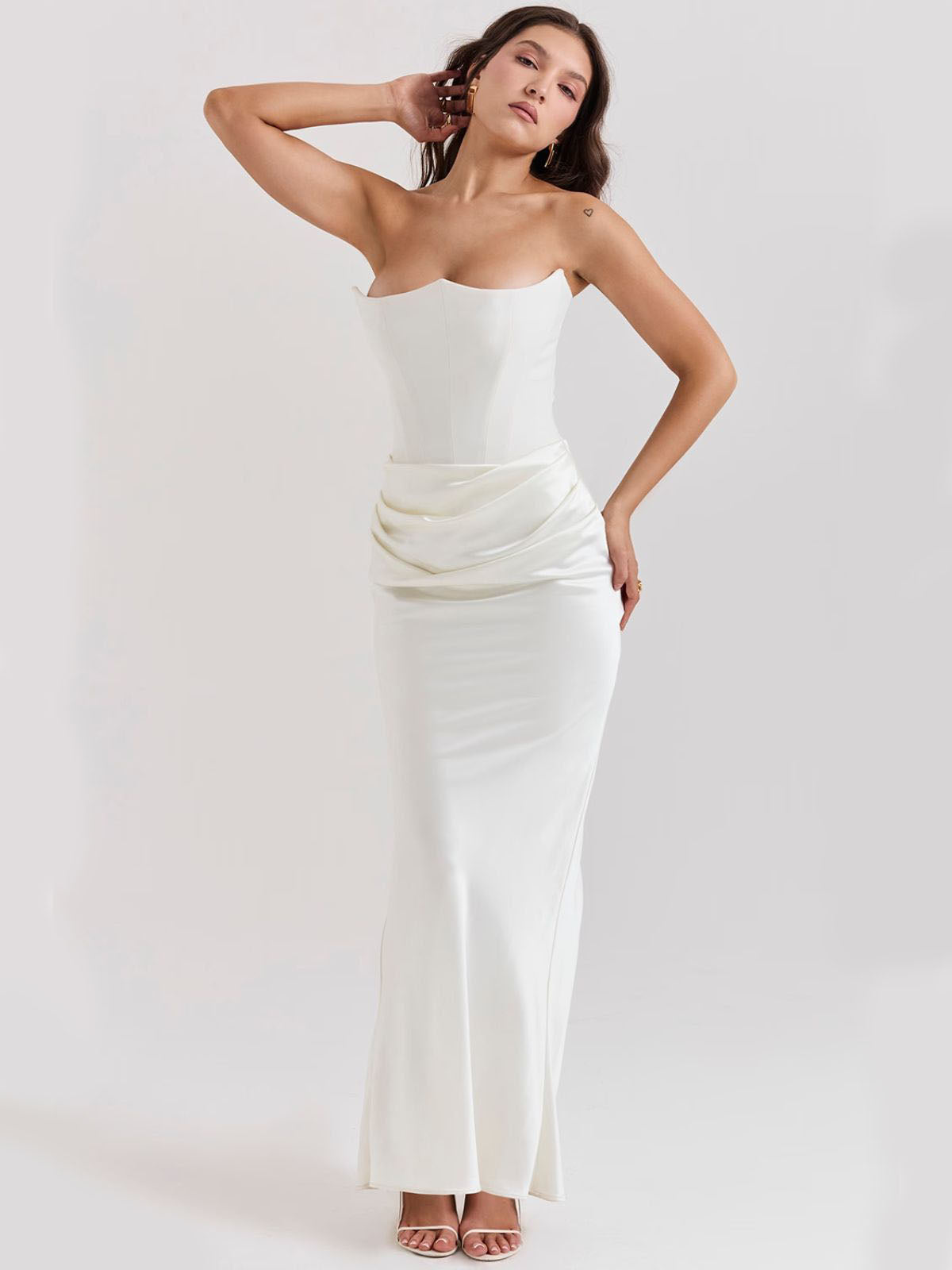 Celestine Corset Maxi Dress - White, back view showcasing the seamless zip closure and structured corset fit.