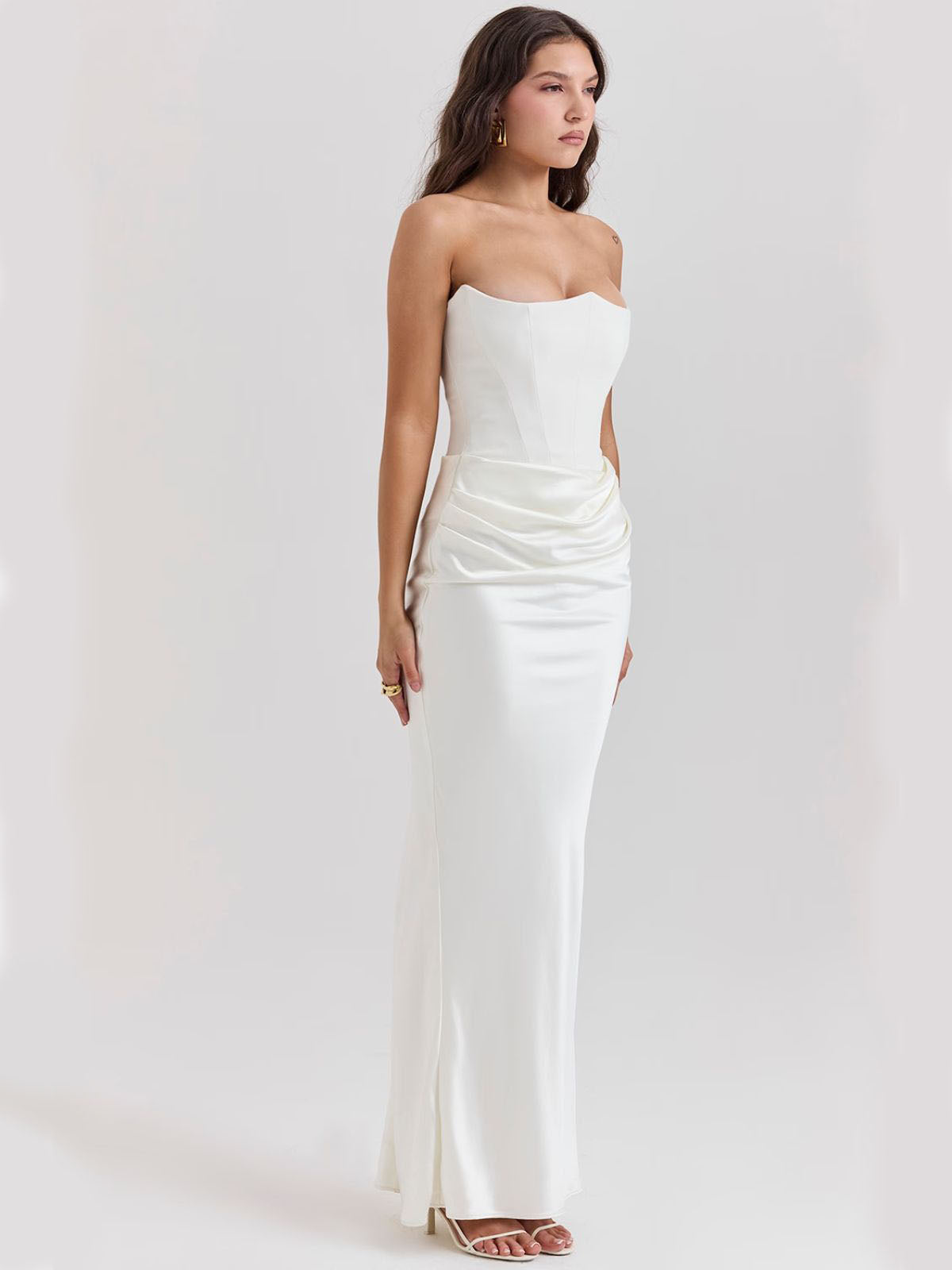 Celestine Corset Maxi Dress - White, elegant front pose showcasing the strapless corset bodice and draped satin maxi skirt.
