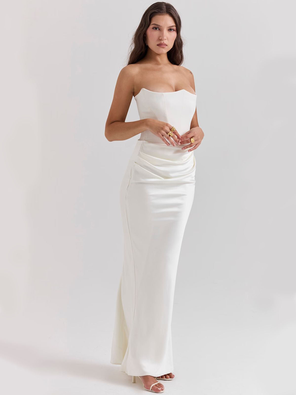 Celestine Corset Maxi Dress - White, lifestyle shot highlighting the timeless elegance of this strapless satin maxi dress.