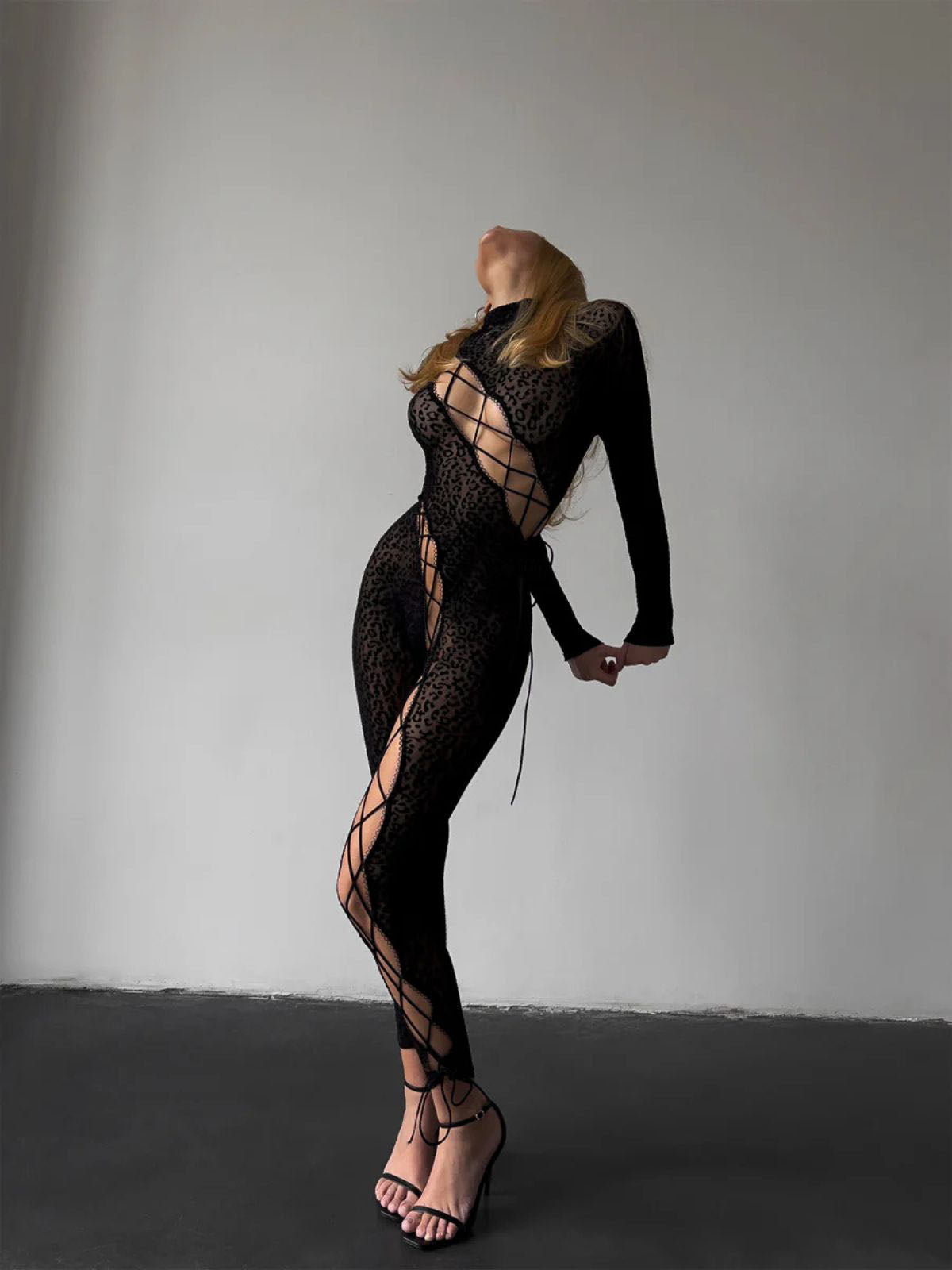 cutout bodysuit with lace-up leg and sheer mesh panels, black