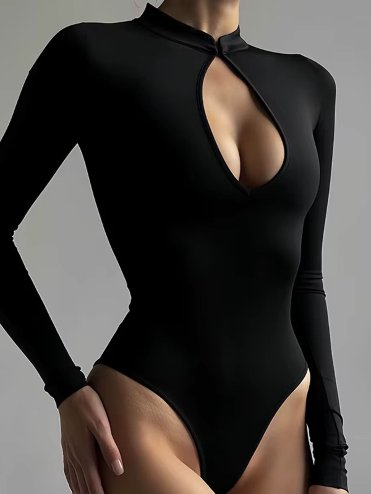 Eclipse Black High Neck Bodysuit full-body view displaying elegant design, perfect for casual and formal outfits.