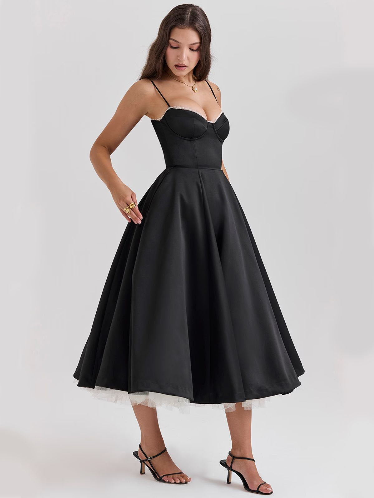 Eclipse Corset Gown – A chic black corset dress with a lace-trimmed neckline, structured bodice, and vintage-style tulle underskirt.
