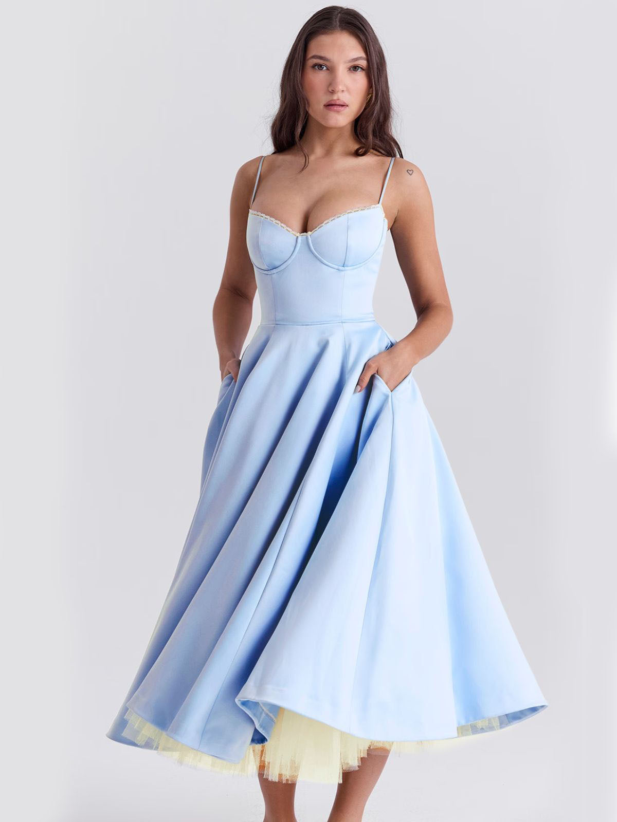 Eclipse Corset Gown – A glamorous blue corset dress with adjustable straps, a fitted waist, and a full-circle flared skirt.