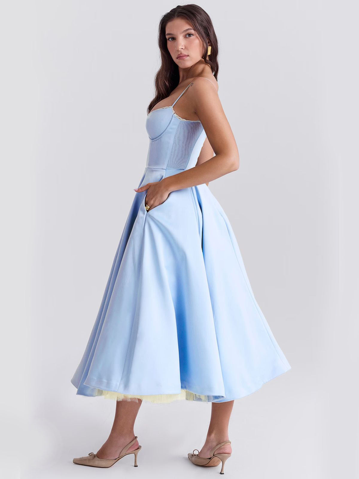 Eclipse Corset Gown – A vintage-inspired blue corset dress with a structured bodice, lace trim, and a voluminous flared skirt.