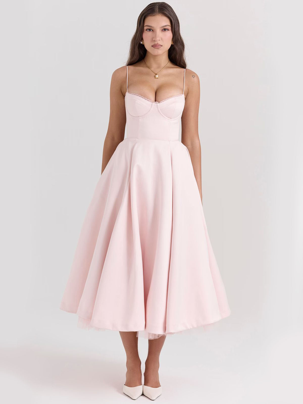 Eclipse Corset Gown – A glamorous pink corset dress with adjustable straps, a defined waist, and a flowy skirt for a dreamy look.
