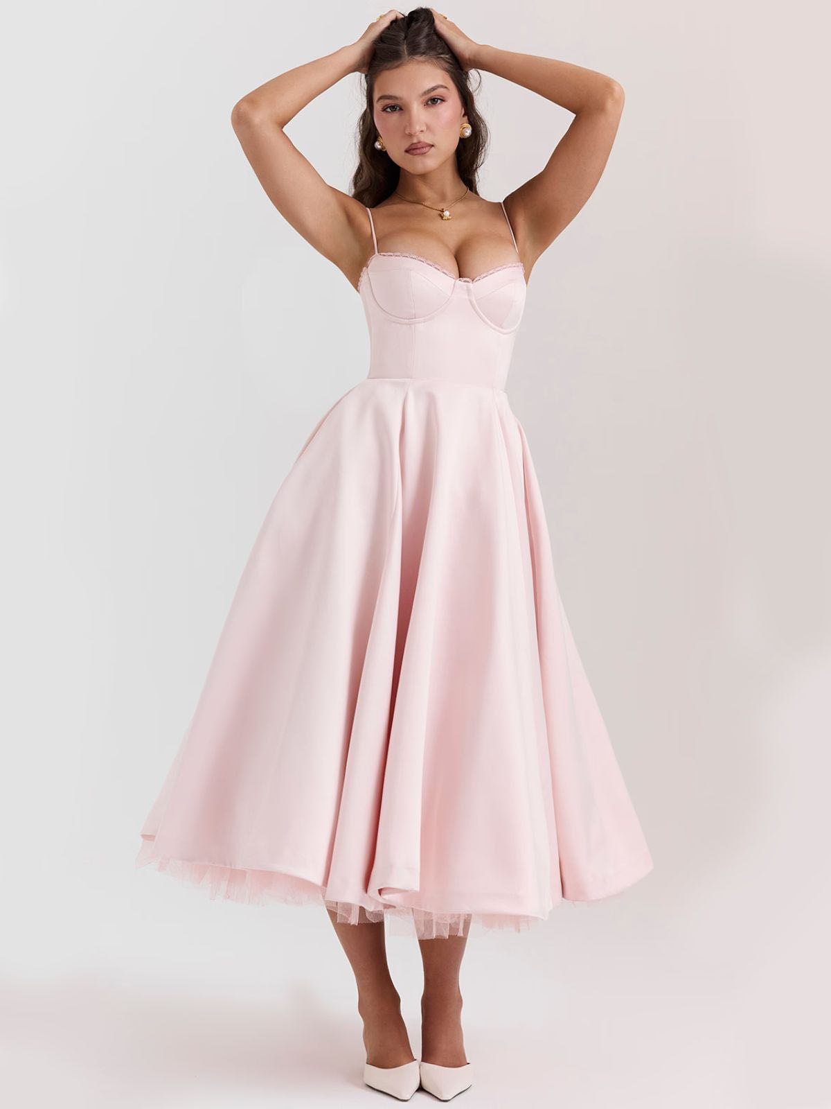 Eclipse Corset Gown – A retro-style pink corset dress with a satin finish, structured bodice, and a soft tulle underlayer for elegance.