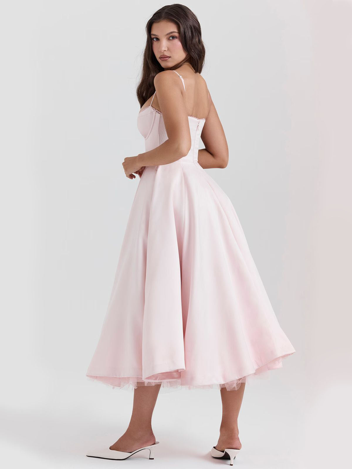 Eclipse Corset Gown – A soft and romantic pink corset dress designed for elegance, with delicate details and a graceful flowing skirt.