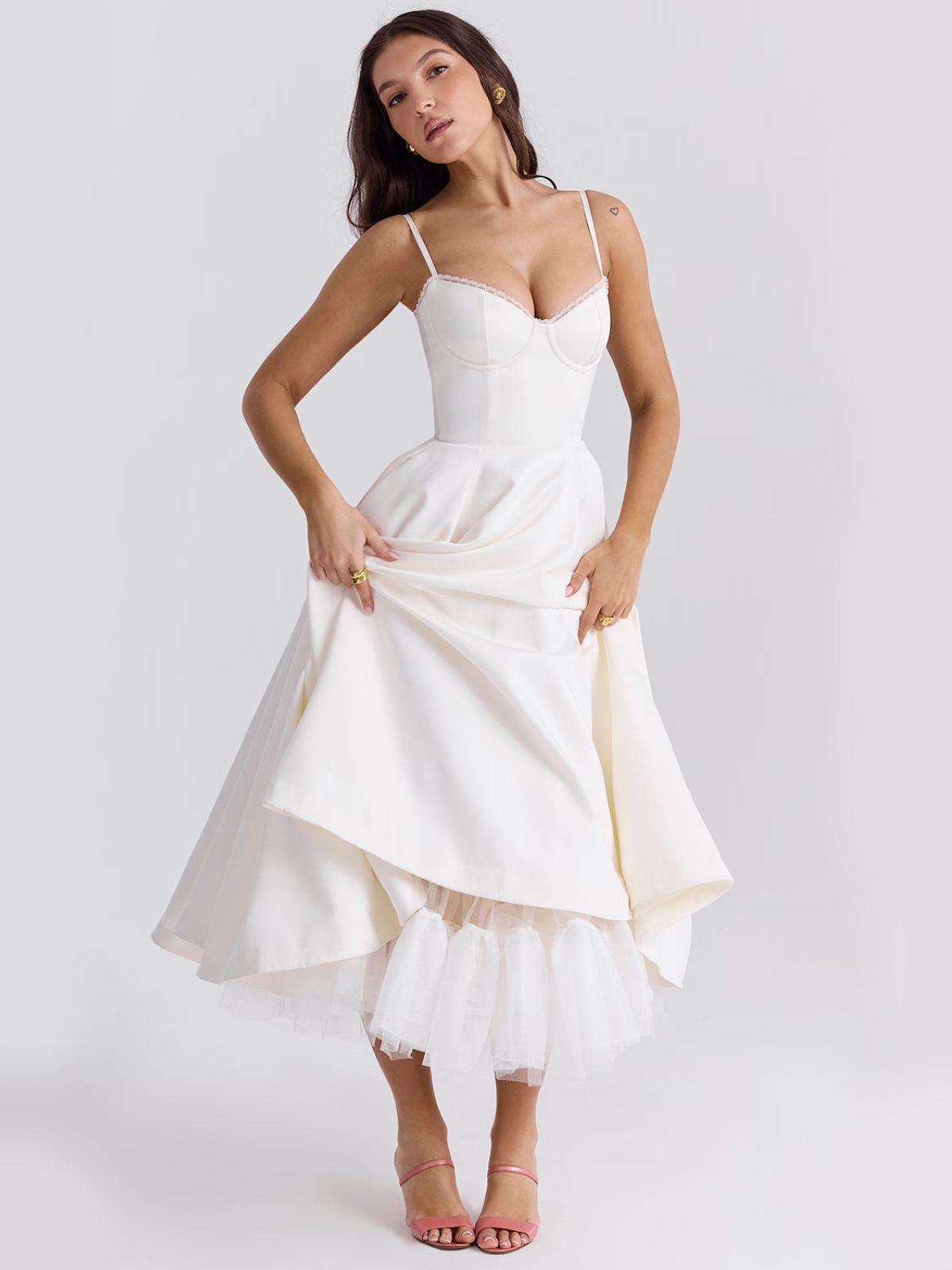 Eclipse Corset Gown – A vintage-inspired white corset dress with a structured bodice, delicate lace trim, and a voluminous flared skirt.