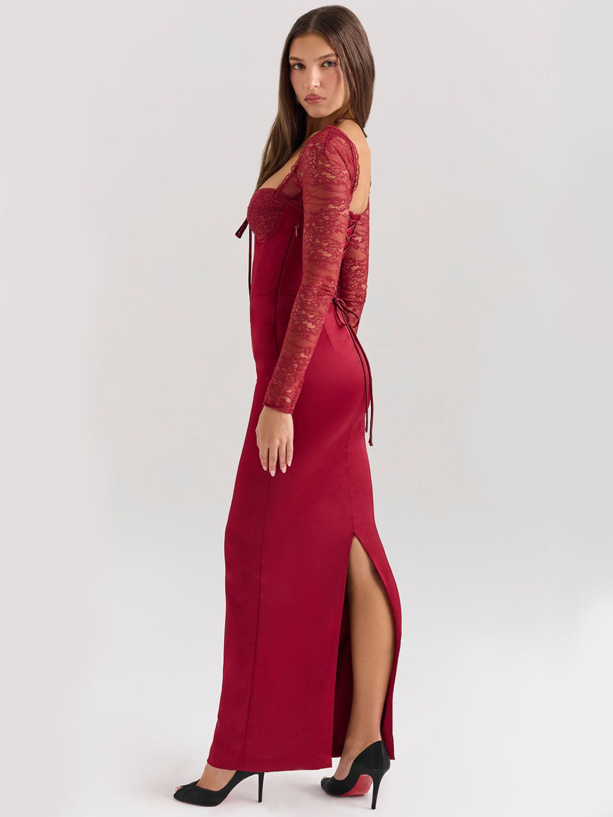 Elara Satin Maxi Corset Dress - Cherry, elegant pose showing lace long sleeves and sculpted bodice.