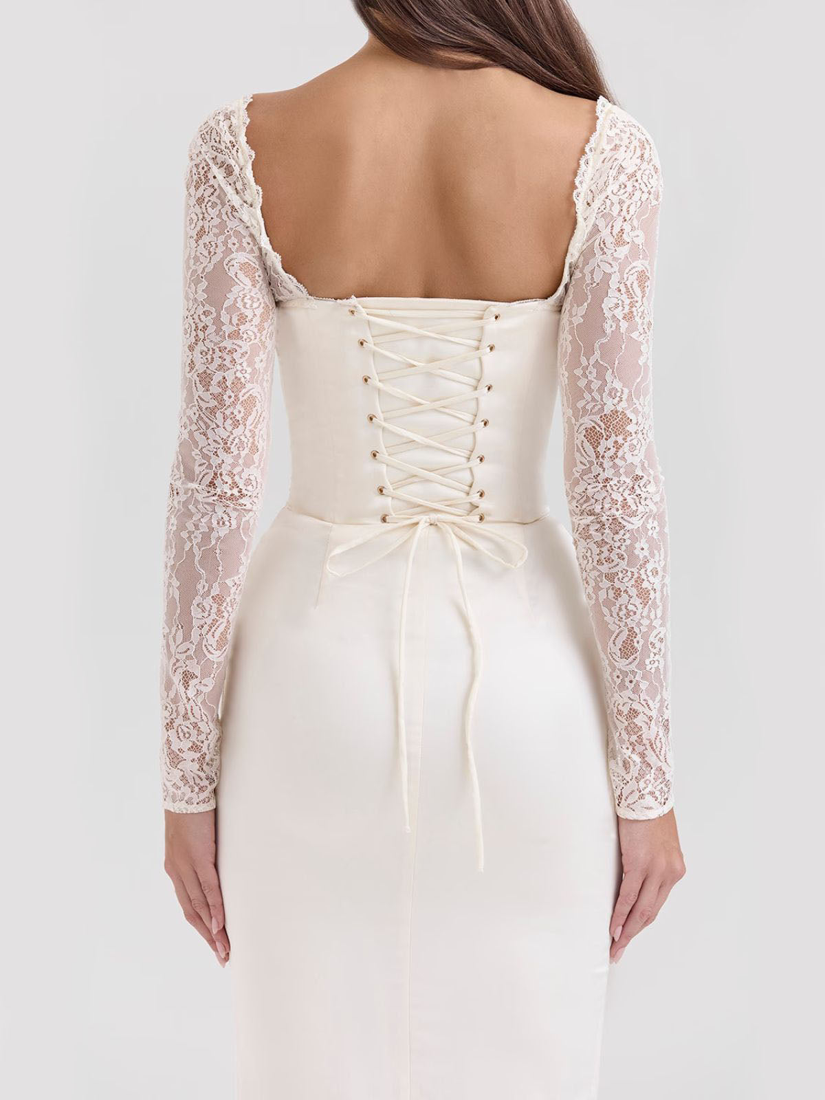 Elara Satin Maxi Corset Dress - Ivory, editorial shot highlighting the soft satin texture.