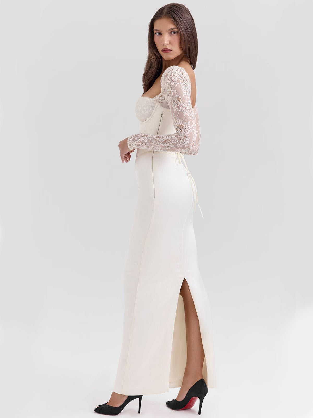 Elara Satin Maxi Corset Dress - Ivory, side view highlighting the elegant fit and lace sleeves.