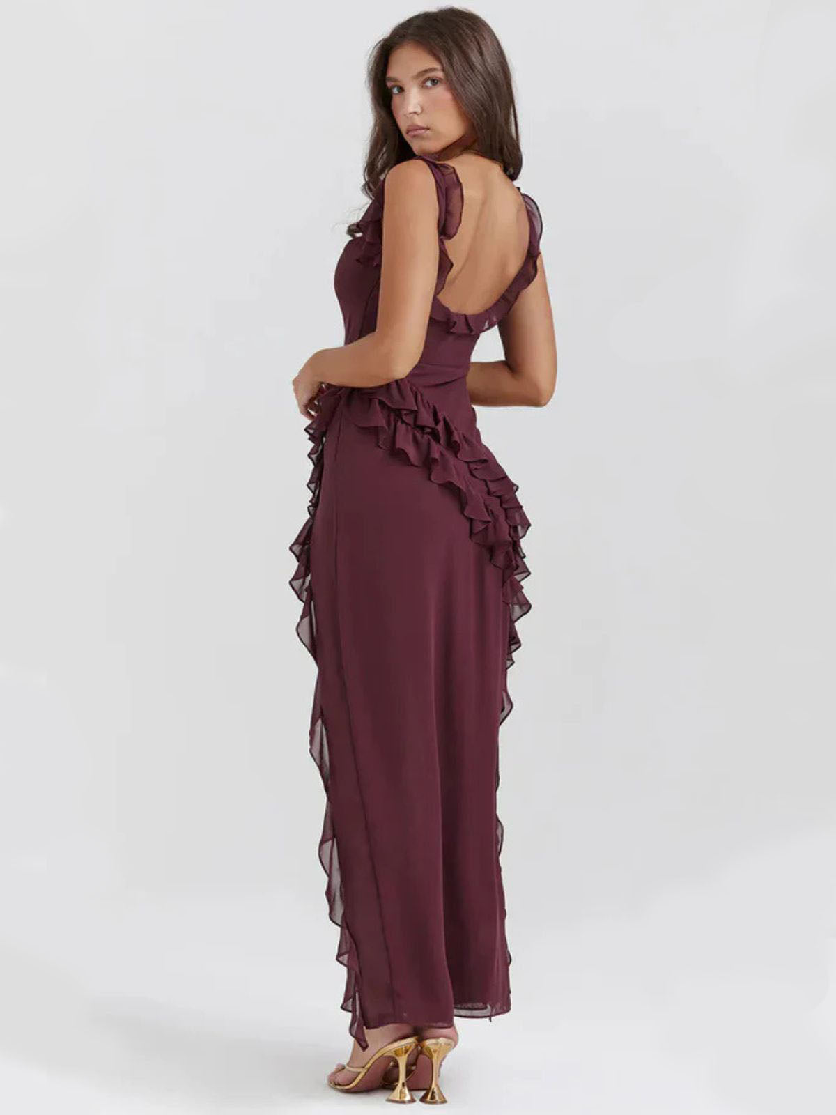 Elysian Ruffle Maxi - Brown back view showcasing open-back detail, delicate shoulder ruffles, and a sleek silhouette.