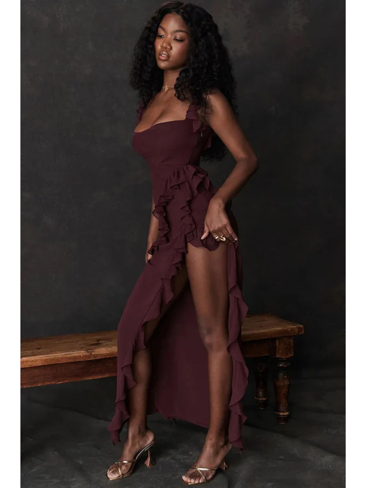 Elysian Ruffle Maxi - Brown editorial-style shot with soft lighting, highlighting luxurious fabric and feminine design.
