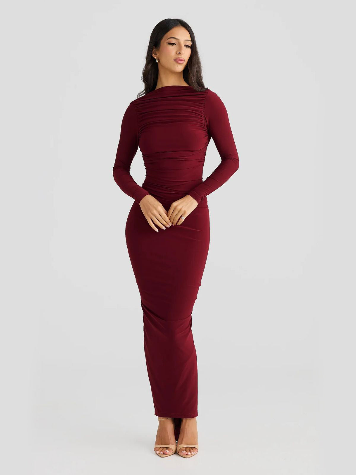 Evelina Backless Maxi Dress in red, highlighting ruched details for a sophisticated prom or evening look.