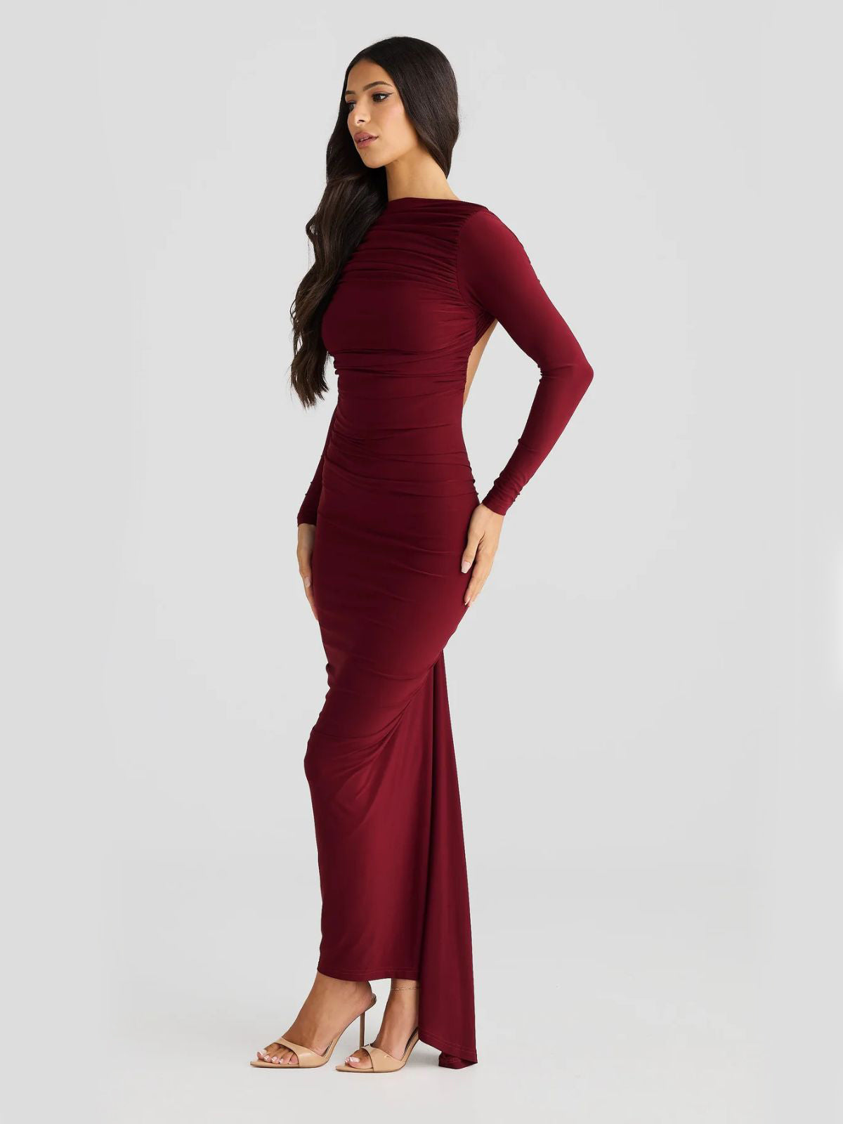 Evelina Backless Maxi Dress in red, front and side view showcasing elegance and sleek tailoring.