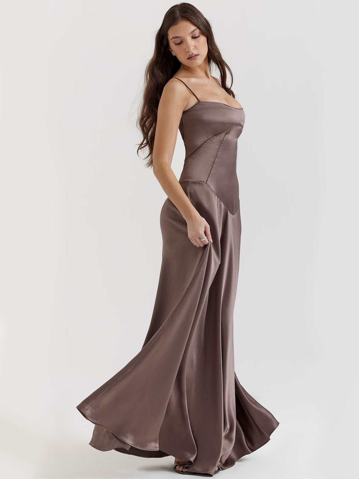 Gray backless dress featuring a corset waist, elegant drape, and luxurious satin fabric, designed for formal evening wear.
