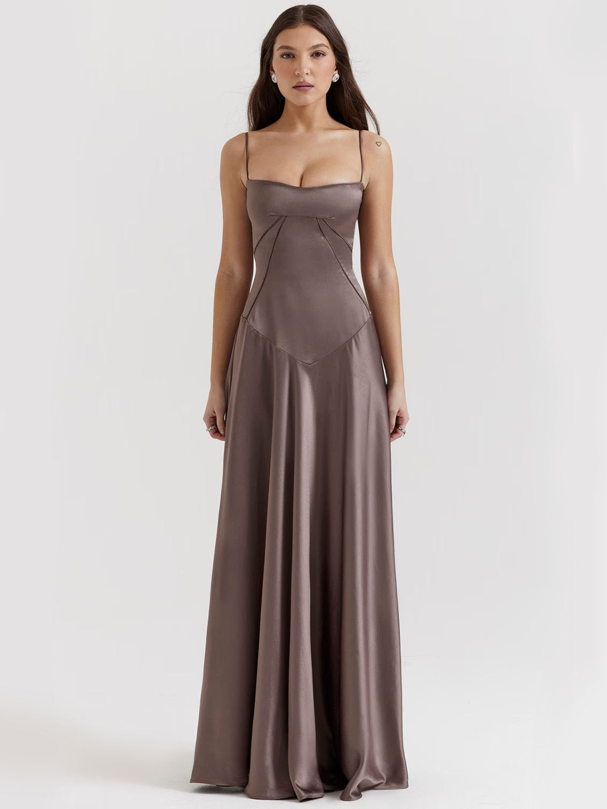 Gray backless dress featuring a flattering corset-inspired fit, draped satin fabric, and an effortless maxi-length skirt.