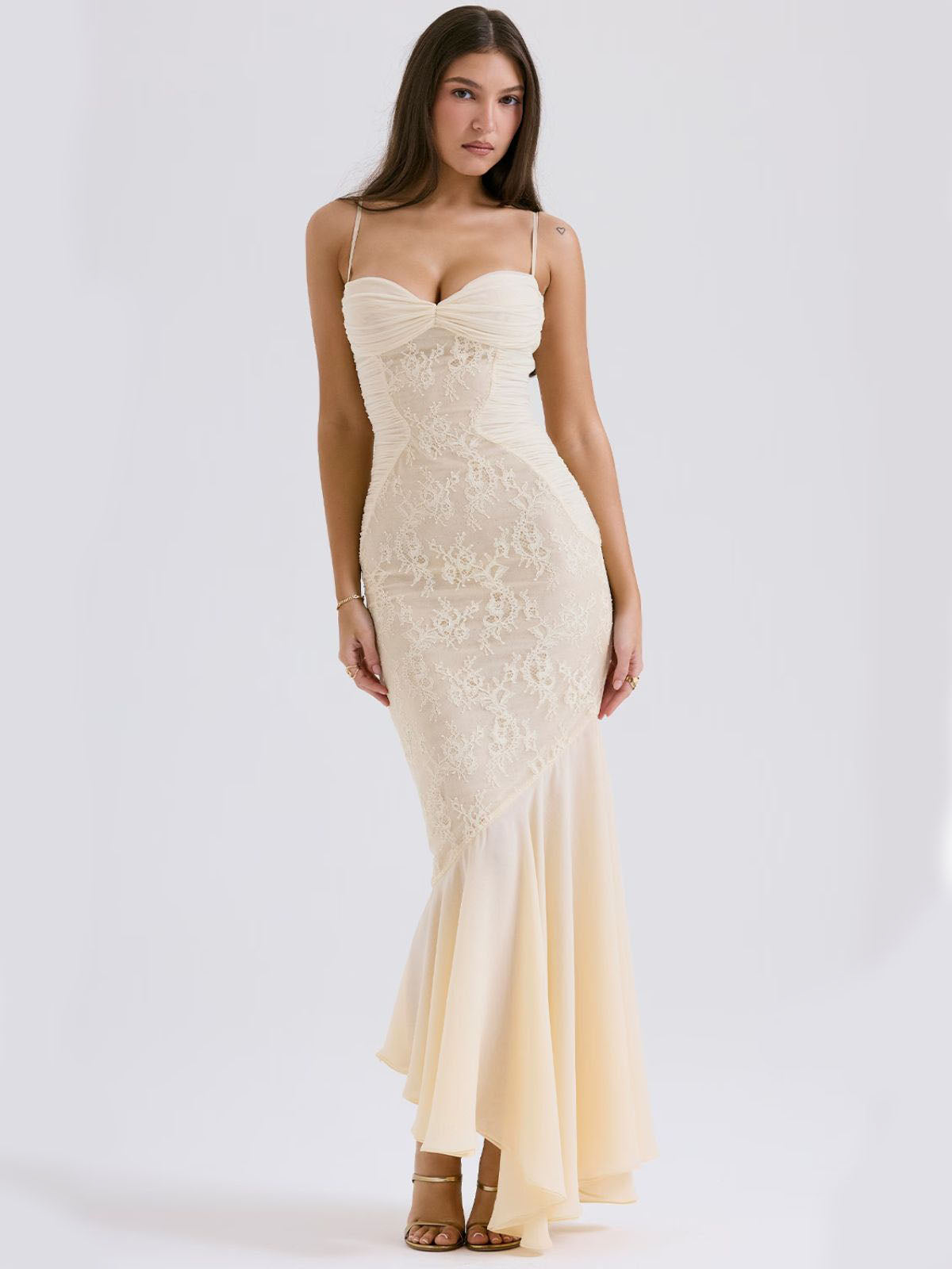 Ivory Grace Lace Gown – floral lace maxi dress with a sleek low back, lace details, and a flowy silhouette in an elegant back view.
