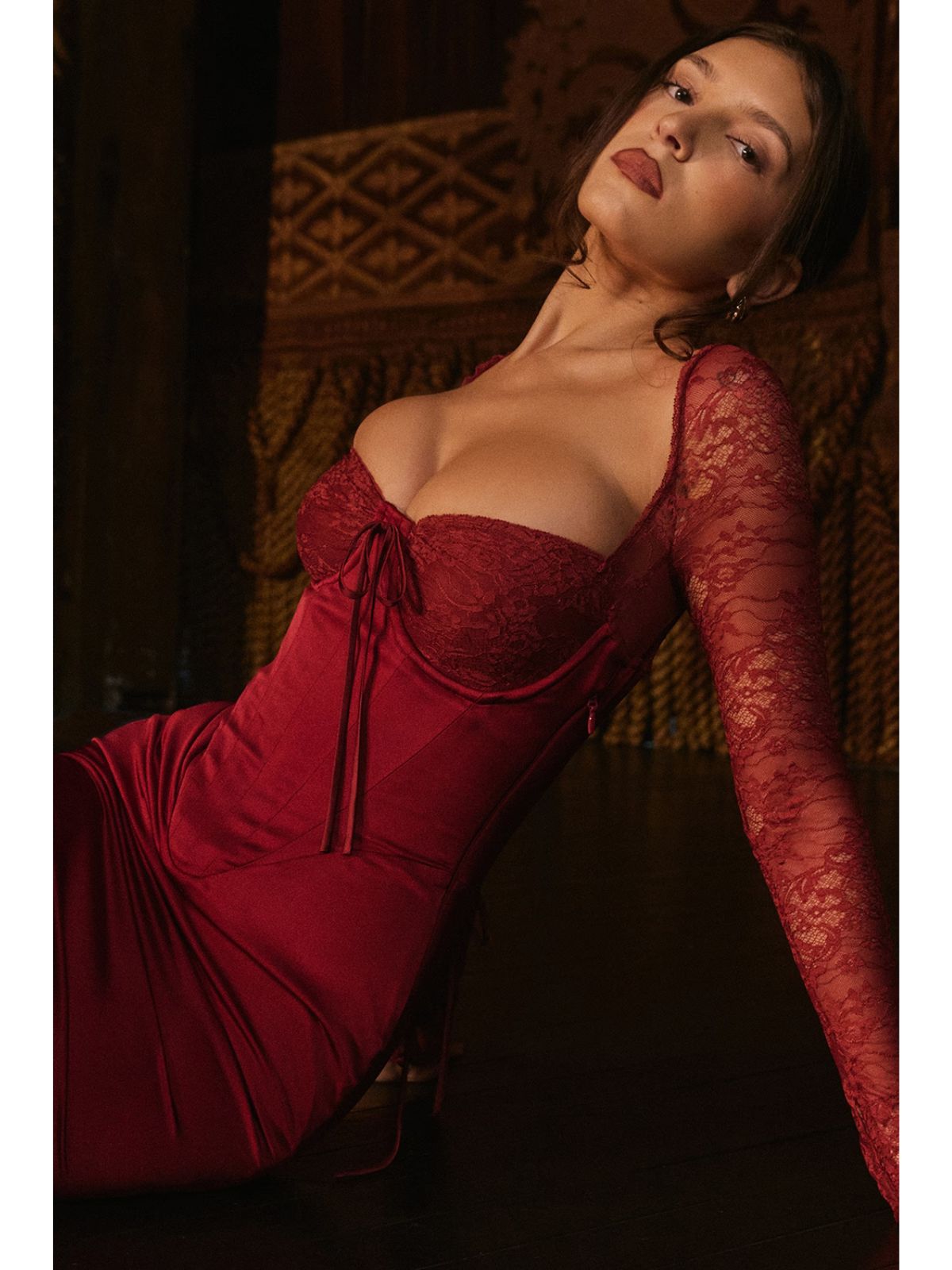 Elara Satin Maxi Corset Dress - Cherry, editorial shot with moody lighting emphasizing luxe satin fabric.
