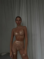 Lingerie Nude Halo Set in beige tone, styled with mesh texture and gold metal ring accents.