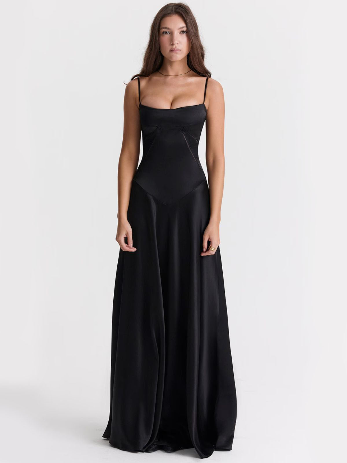 Ophelia black backless dress with a fitted bodice, delicate straps, and a flowing satin maxi skirt for elegant occasions.