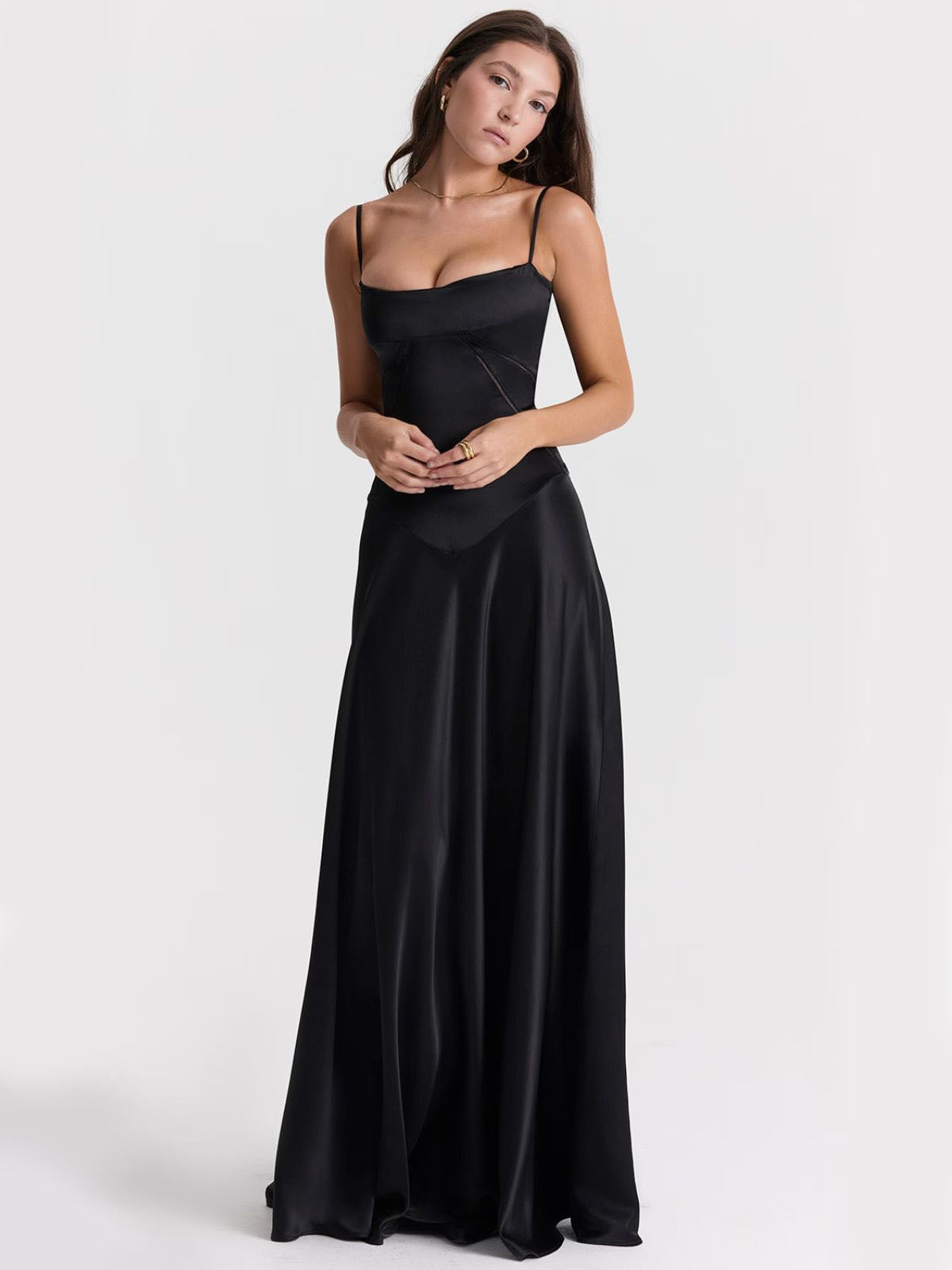Ophelia black backless dress featuring a curve-enhancing fit, lace-up back, and silky satin fabric for a glamorous look.