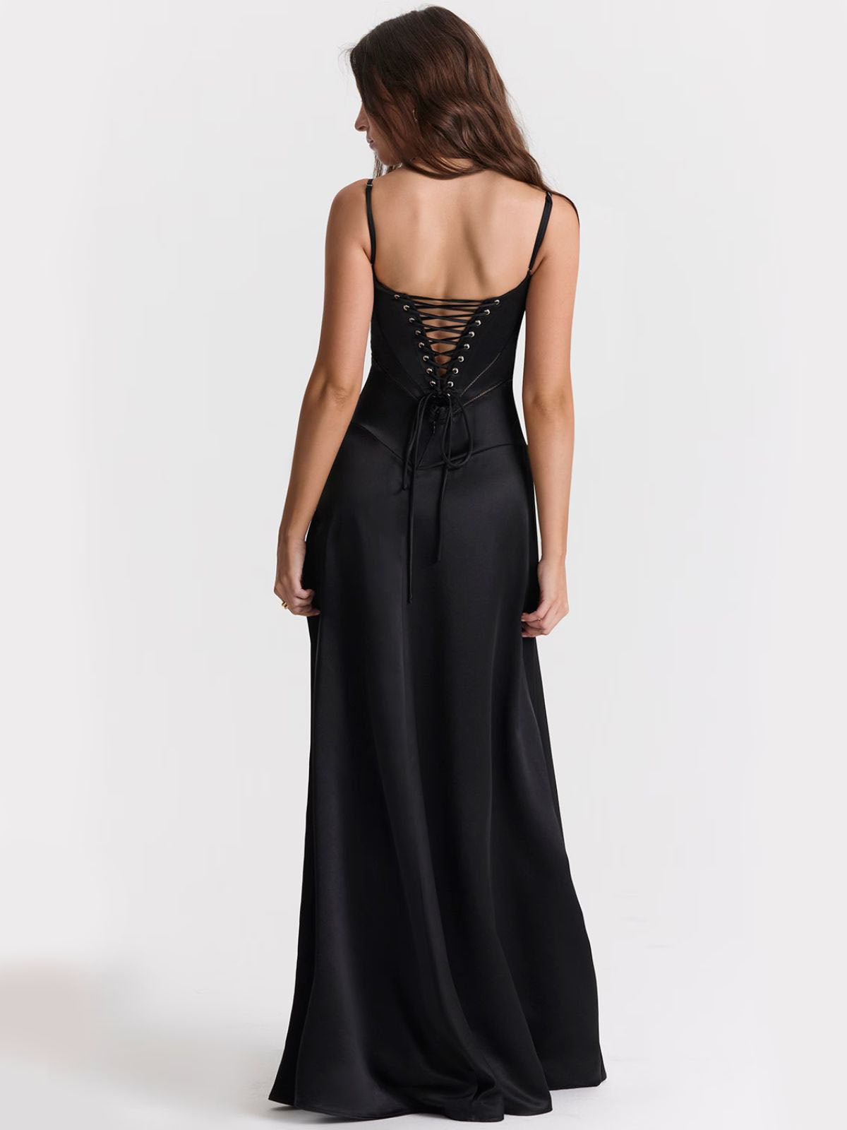 Ophelia black backless dress with an open-back lace-up design, featuring soft satin fabric and a perfect evening fit.