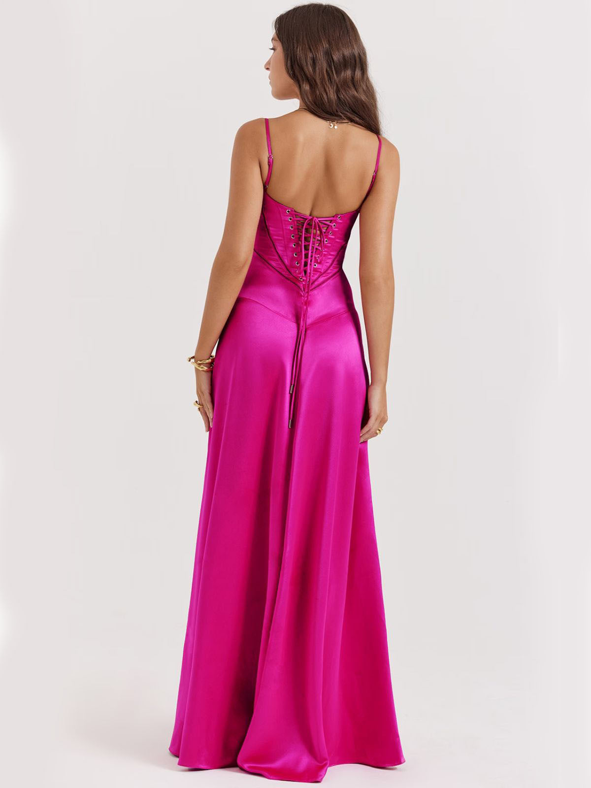 Pink backless dress with a lace-up back and an ultra-flattering silhouette, perfect for galas, proms, and special events.