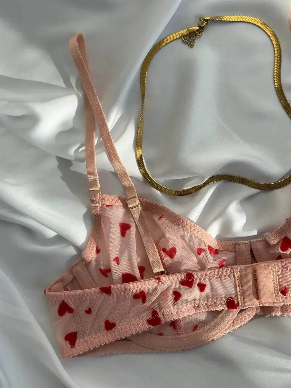 Pink Heart Lingerie bra back detail with adjustable straps and sheer heart mesh