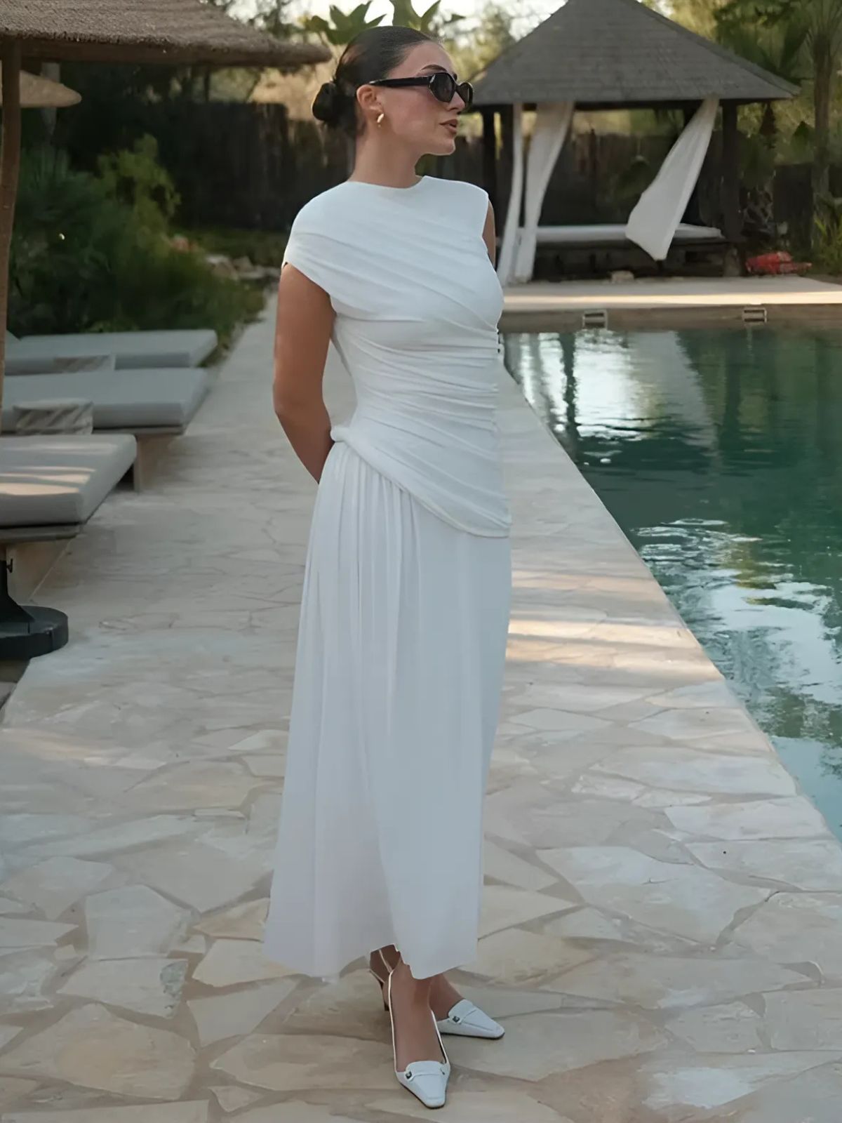 Pleated white bodycon maxi dress with a short sleeve design, a great choice for summer weddings or vacations.