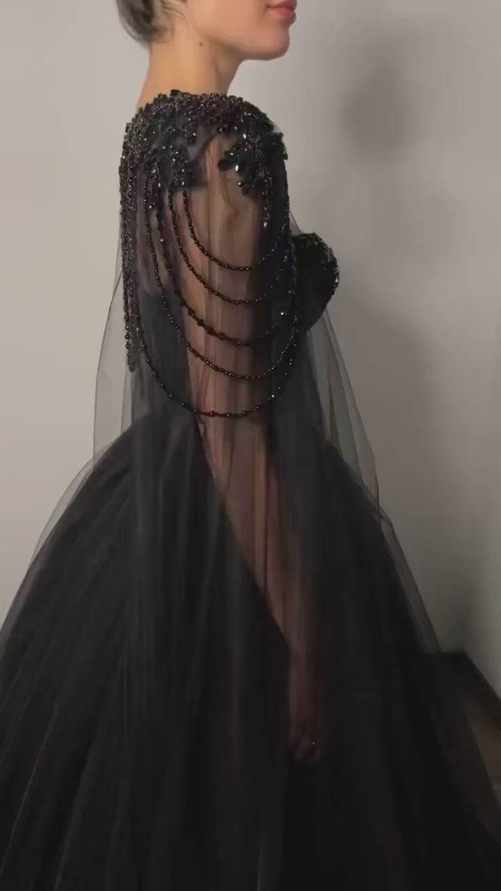 Raven Noir Embellished Wedding Gown dramatic walkthrough video highlighting intricate details and flowing silhouette.