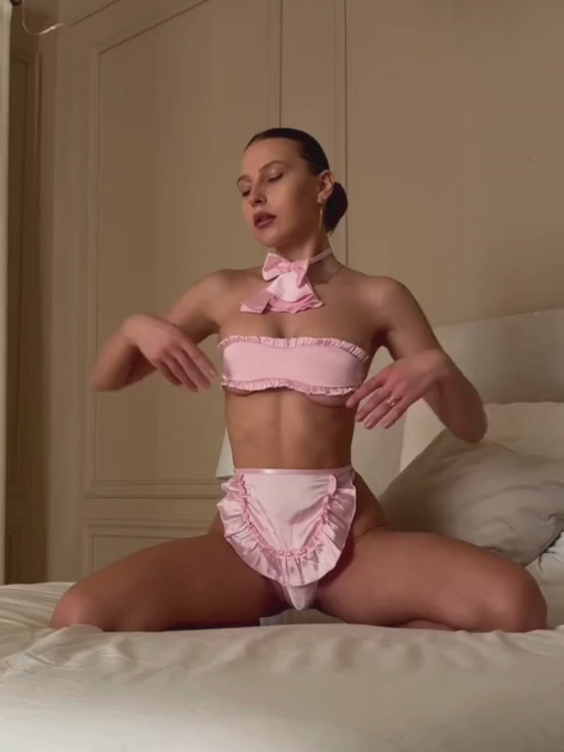 Pink Maid Lingerie Set video showing bandeau top, ruffle apron thong and bow neck scarf in motion