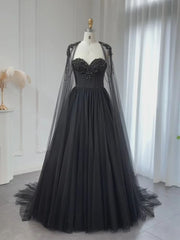 Raven Noir Embellished Wedding Gown beautifully presented in a showroom, capturing its timeless black elegance.