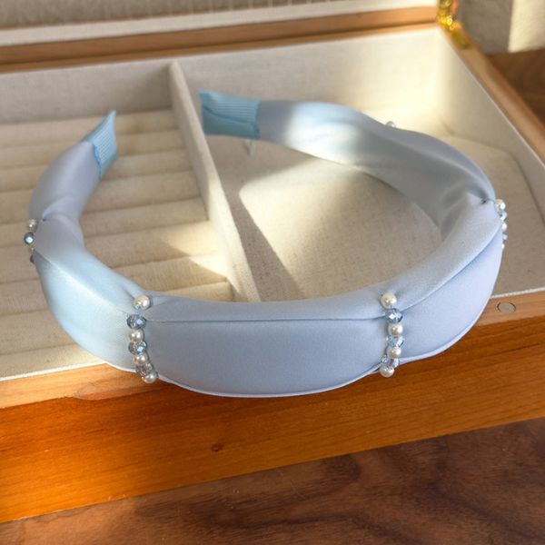Satin Pearl Accent Headband featuring elegant detailing and soft pastel tones – perfect for stylish everyday or bridal wear