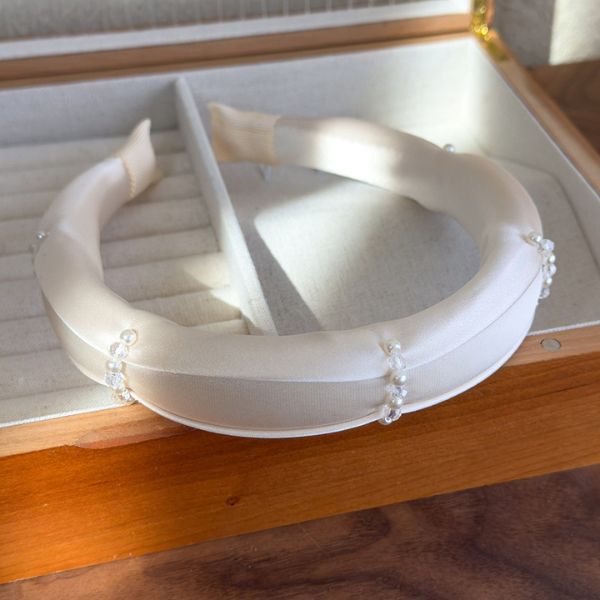 Satin Pearl Accent Headband featuring elegant detailing and soft pastel tones – perfect for stylish everyday or bridal wear