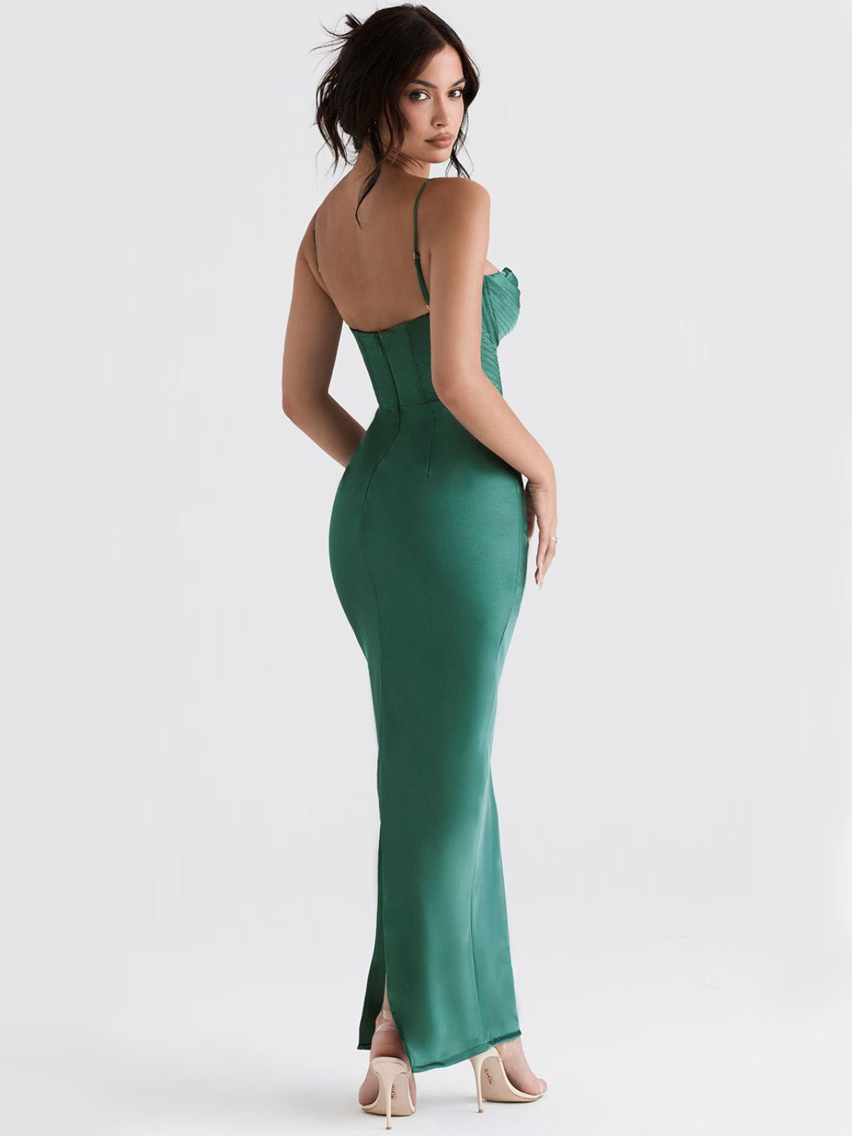 Whisper Corset Maxi Dress - Green, side-back view showcasing the fitted silhouette and corset design.